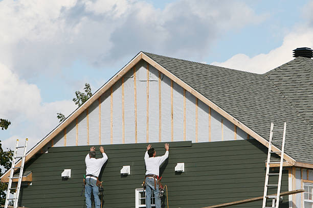 Professional Emergency Siding Repair technician working in Mineral Ridge, OH